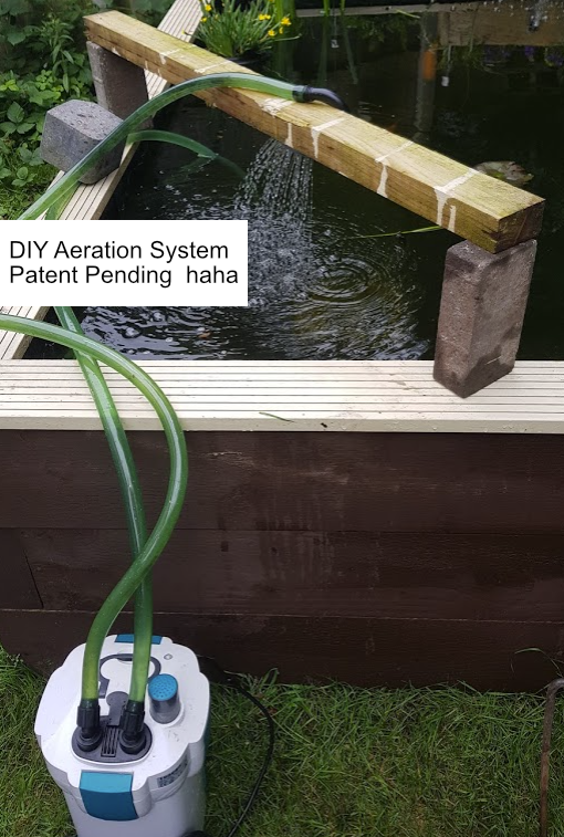Home made water aerator for a raised pond